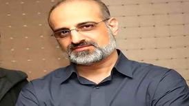 دانلود آهنگ بین زمین و آسمون مونده دل من از محمد اصفهانی