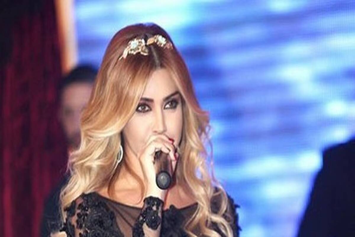 تصاویری از خواننده زن عرب و همسر و فرزندانش